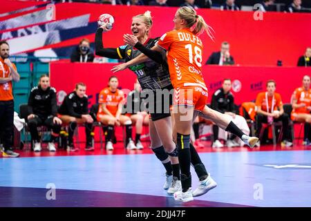 KOLDING, DENMARK - DECEMBER 14: Larissa Nusser of Netherlands, Kim Naidzinavicius of Germany, Kelly Dulfer of Netherlands during the Women's EHF Euro Stock Photo
