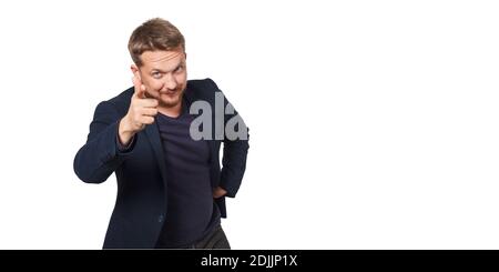 Man point to viewer while standing against white background. Stock Photo