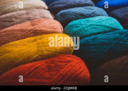 Large selection of sewing threads in different colors Stock Photo