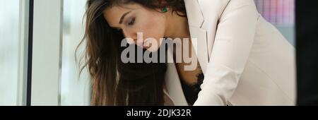 Beautiful businesswoman working with documents in office Stock Photo