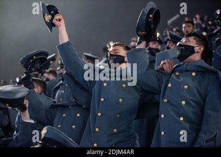 U.S. Navy midshipmen cheer from the stands during the 121st Army-Navy football game at Michie Stadium December 12, 2019 in West Point, New York. The Army Black Knights shutout the Navy Midshipmen 15-0. Stock Photo