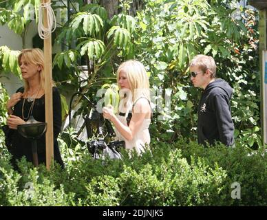 Exclusive!! Avril Lavigne and Deryck Whibley leave a trendy Los Angeles hotel. Avril is not wearing her wedding ring. The woman in the photo could be her mother. 8/4/06 Stock Photo