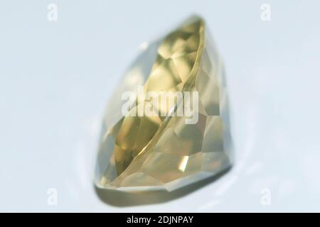 Natural yellow citrine on gray background Stock Photo