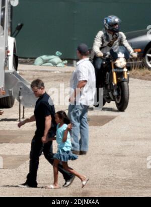 Matt Damon brings his family along to the set of Oceans Thirteen filming in Los Angeles, Ca. including his 2 month old daughter Isabella. He had a broad smile on his face when he helped lift the newborn out of the car. He also spent time with his wife Luciana's daughter Alexa, holding her hand as he showed her around the base camp. 8/24/06 Stock Photo