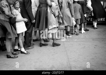 Children in front of Moving Picture Theater, Easter Sunday Matinee, Black Belt, Chicago, Illinois, USA, Edwin Rosskam for U.S. Farm Security Administration, April 1941 Stock Photo