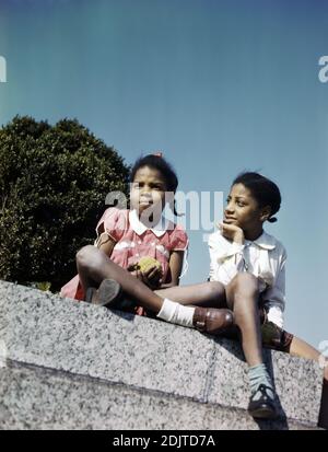 Two Little Girls in Park near Union Station, Washington, D.C., USA, U.S. Office of War Information, 1943 Stock Photo