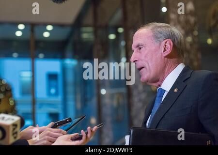 Following his meeting with President-elect Donald Trump, Indiana Senator Dan Coats spoke briefly with the press, at Trump Tower in New York, NY, USA on November 30, 2016. (Photo by Albin Lohr-Jones) Stock Photo