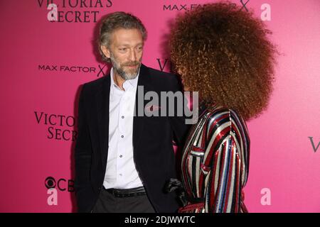 EDITORIAL USE ONLY. Vincent Cassel and his girlfriend Tina Kunakey arriving at the Victoria’s Secret Fashion Show at the Grand Palais on November 30, 2016 in Paris, France. Photo by Marechal/Domine/Zabulon/ABACAPRESS.COM Stock Photo