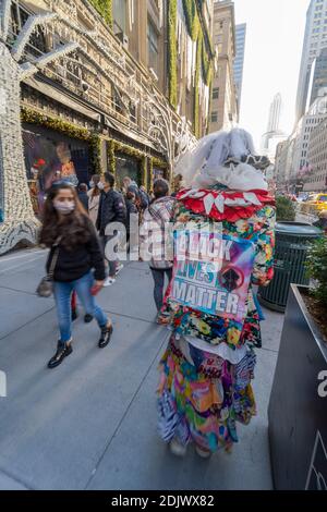 People increased Midtown Manhattan in Sunday during Pandemic of COVID-19. Stock Photo