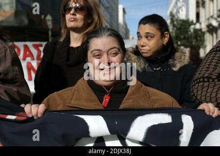 Disabled groups from from across Greece hold demonstration in central Athens, Greece, against austerity measures and spending cuts in healthcare, on Friday December 2, 2016.The demonstration is being carried by people with disabilities with their escorts and relatives as part of the International Day of Persons with Disabilities. Photo by Panayiotis Tzamaros/ABACAPRESS.COM Stock Photo