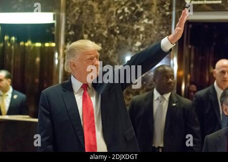 President-elect Donald Trump greets appears in Trump Tower lobby follwing his meeting with Son Masayoshi, CEO and founder of SoftBank, in New York, NY, USA on December 6, 2016. (Photo by Albin Lohr-Jones) Stock Photo