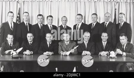 Original 7 Astronauts pose for a group photo with the second group of astronauts in Washington, D.C. on March 1, 1963. Front row seated are the original 7 astronauts, left to right: L. Gordon Cooper, Jr., Virgil I. Grissom, M. Scott Carpenter, Walter M. Schirra, Jr., John H. Glenn, Jr., Alan B. Shepard, Jr., and Donald K. Slayton all selected in 1959. The back row standing are the second group of astronauts, left to right: Edward H. White, II, James A. McDivitt, John W. Young, Elliott M. See, Jr., Charles Conrad, Jr., Frank Borman, Neil A. Armstrong, Thomas P. Stafford, and James A. Lovell, Jr Stock Photo