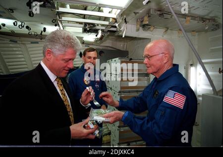 https://l450v.alamy.com/450v/2djxkc4/united-states-president-bill-clinton-prepares-to-use-a-fork-to-sample-some-space-food-while-visiting-nasas-johnson-space-center-jsc-on-april-14-1998-holding-the-food-packet-is-us-senator-john-h-glenn-jr-democrat-of-ohio-currently-in-training-at-jsc-as-a-payload-specialist-for-a-flight-scheduled-later-this-year-aboard-the-space-shuttle-discovery-looking-on-is-astronaut-curtis-l-brown-jr-sts-95-commander-the-picture-was-taken-in-the-full-fuselage-trainer-fft-photo-by-joe-mcnally-national-geographic-for-nasa-via-cnpabacapresscom-2djxkc4.jpg