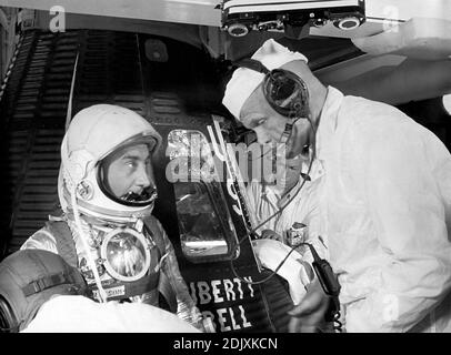 Astronaut Virgil Grissom chats with Astronaut John Glenn prior to entering the Liberty Bell 7 capsule for the MR-4 Mission at Cape Canaveral, Florida on July 21, 1961. The MR-4 mission was the second manned suborbital flight using the Mercury-Redstone booster, which was developed by the Marshall Space Flight Center. Photo by NASA via CNP/ABACAPRESS.COM Stock Photo