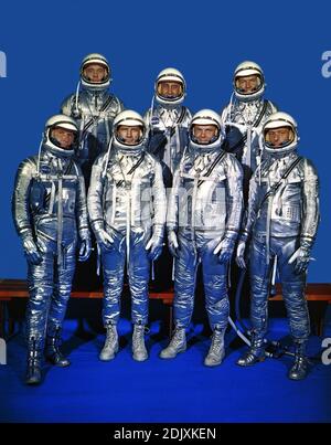 Original 7 astronauts in Mercury space suits photographed on December 3, 1962. Front row, left to right, are Walter M. Schirra Jr., Donald K. Slayton, John H. Glenn, Jr., and M. Scott Carpenter. Back row, from the left, are Alan B. Shepard Jr., Virgil I.Grissom and L. Gordon Cooper Jr. EDITOR'S NOTE: Since this photo was made: Grissom died on January 27, 1967, in the Apollo 1/Saturn 204 fire at Cape Kennedy, Florida; Slayton died June 13, 1993 in League City, Texas, from complications of a brain tumor. Shepard died on July 21, 1998. Cooper died October 4, 2004. Schirra died on May 2, 2007 Astr Stock Photo