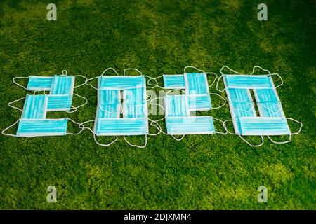 2020 Year Numbers Composed of Medical Masks Stock Photo