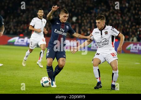 PSG's Marco Verratti battling Nice's Remi Walter during the Ligue 1 soccer match, PSG vs Nice in Parc des Princes, France, on December 11th, 2016. PSG and Nice drew 2-2. Photo by Henri Szwarc/ABACAPRESS.COM Stock Photo