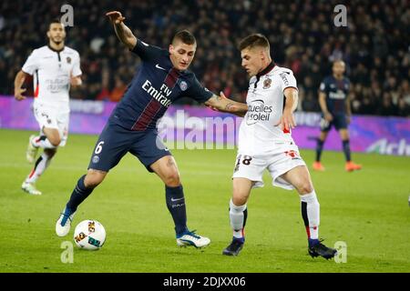 PSG's Marco Verratti battling Nice's Remi Walter during the Ligue 1 soccer match, PSG vs Nice in Parc des Princes, France, on December 11th, 2016. PSG and Nice drew 2-2. Photo by Henri Szwarc/ABACAPRESS.COM Stock Photo