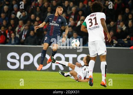 PSG's Layvin Kurzawa battling Nice's Remi Walter during the Ligue 1 soccer match, PSG vs Nice in Parc des Princes, France, on December 11th, 2016. PSG and Nice drew 2-2. Photo by Henri Szwarc/ABACAPRESS.COM Stock Photo