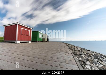 Bathing stalls, beach huts, long exposure, Dagebüll, North Sea, Schleswig-Holstein, Germany, Europe Stock Photo