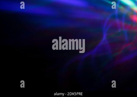 Abstract photo of motion and colorful lights at dark. Abstract high resolution background. Copy space. Stock Photo