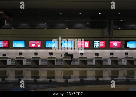 Empty ticket counters at the McCarran International Airport (LAS) amid the global coronavirus COVID-19 pandemic, Sunday, Dec. 13, 2020, in Las Vegas. Stock Photo