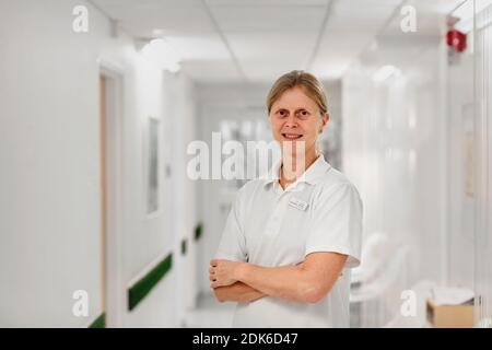 Smiling nurse in hospital Stock Photo