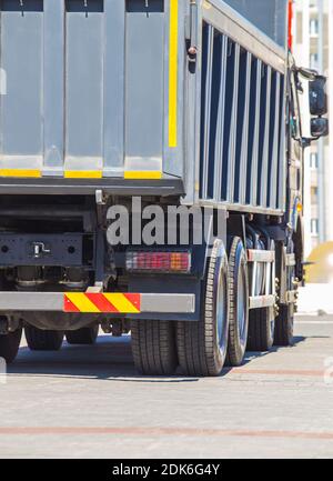 big dump truck goes  on highway Stock Photo