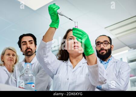Scientists working in laboratory Stock Photo