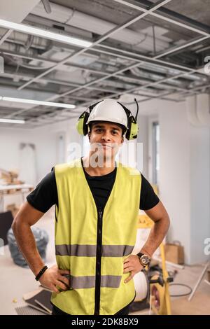 Portrait of worker wearing hardhat Stock Photo