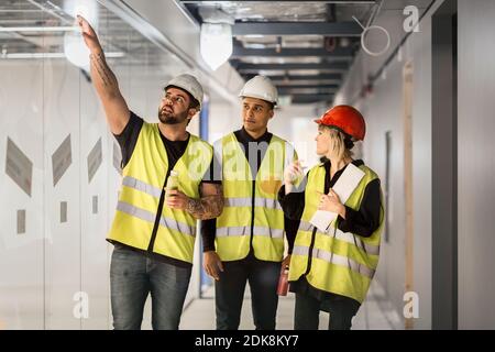 Workers at construction site Stock Photo