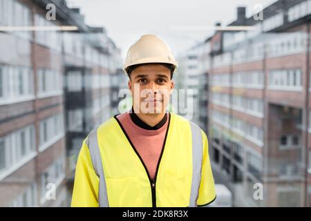 Portrait of worker wearing hardhat Stock Photo
