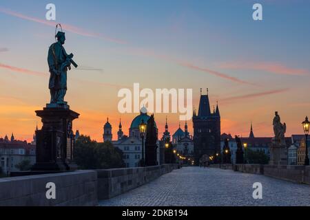Praha, Charles Bridge (Karly most, Karlsbrcke), Old Town Bridge Tower (Staromestska mostecka vež), sunrise in Vltava, Moldau, Praha, Prag, Prague, Czech Stock Photo