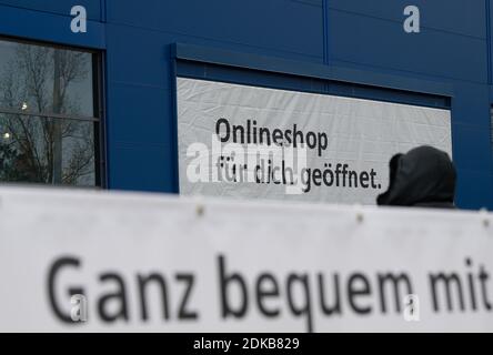 Berlin, Germany. 15th Dec, 2020. 'Online shop open for you' is written on a poster at the Ikea store in Schöneberg. During the lockdown, Ikea and other stores want to enable their customers to 'click & collect' - that is, to pick up goods previously purchased online in the stores at specially set up pick-up stations. Credit: Paul Zinken/dpa/Alamy Live News Stock Photo