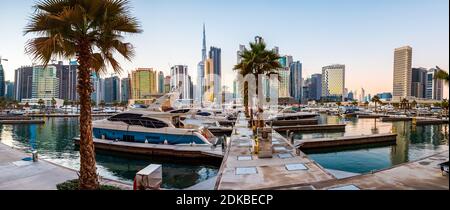 Dubai, United Arab Emirates - November 19, 2020: Panoramic view at Dubai skyline view from the Marasi marina waterfront in the Bur Dubai downtown area