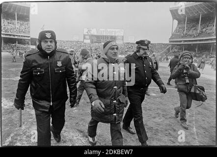 Oakland Raiders quarterback Jim Plunkett takes a snap during the playoff  game between the Cleveland Browns and the Oakland Raiders at Cleveland  Stadium on Jan. 4, 1981. Gene Upshaw is number 63