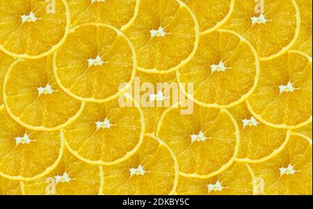 Citrus slices background. Cut yellow fruit. Summer design. Stock Photo