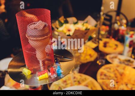 White hookah on the wooden table and blurred lights background Stock Photo