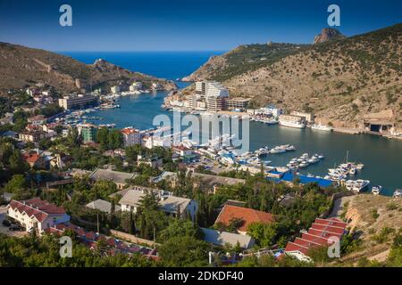 Ukraine, Crimea, View of Balaklava Bay, on the far right is the Entrance to what was a top secret underground submarine base in Soviet times Stock Photo