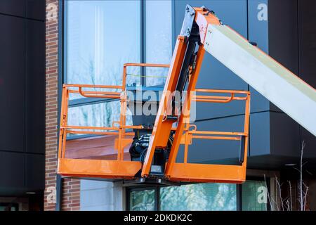 Hydraulic system elevated platform with industry work at high in a boom lift Stock Photo
