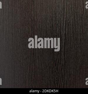 Dark brown wood background texture close-up, background and furniture surface from cabinet, table and door Stock Photo