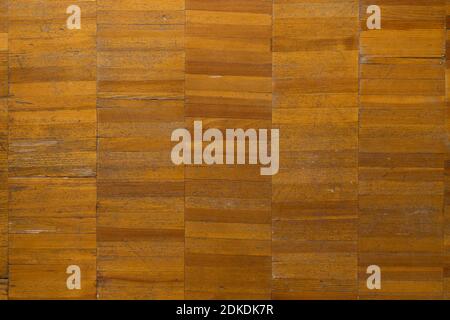 Texture of old light brown parquet, background with scratches and cracks Stock Photo