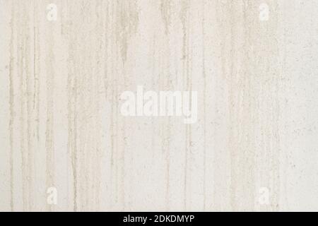 Abstract texture of a white concrete wall with gray smudges and dirt, background Stock Photo