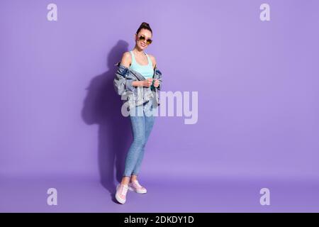 Full length body size view of her she nice-looking attractive lovely pretty charming cheerful content girl posing isolated over bright vivid shine Stock Photo