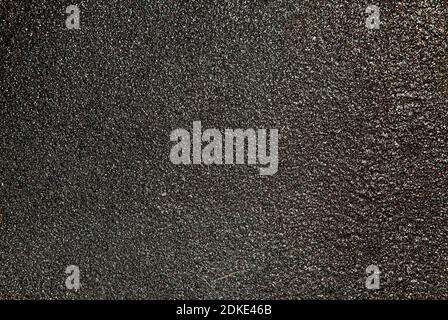Dark gray asphalt texture. Background. Horizontal shot. Stock Photo
