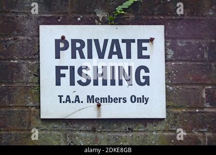 Private fishing sign informing that only members of the Taunton Angling Association may fish on the canal Stock Photo