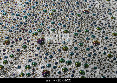 Soap bubbles with oil colors. Suitable as background or wallpaper. Stock Photo