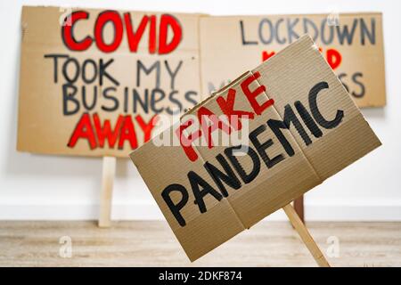 Protestive placard against coronavirus lockdowns close up Stock Photo