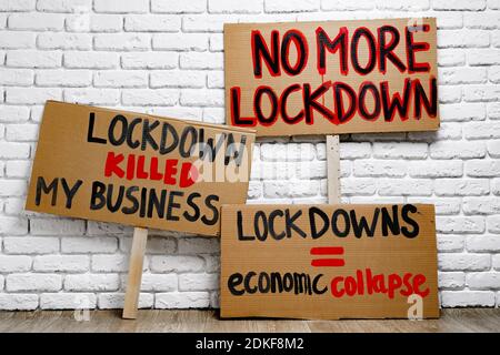 Protestive placard against coronavirus lockdowns close up Stock Photo