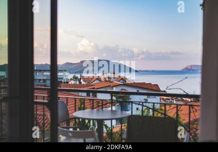 Beautiful view from balcony of red roofs and sea in Kas town on Mediterranean coast, Turkey Stock Photo